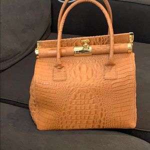 Pele di Giada cognac leather made in Italy bag